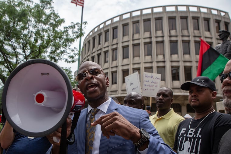 State Rep. Stephen Kinsey (D., Phila.) speaks to the crowd assembled outside of Philadelphia Police headquarters at 8th and race streets to protest the 330 active Philadelphia police officers included in a database of racist Facebook comments in June 2019.