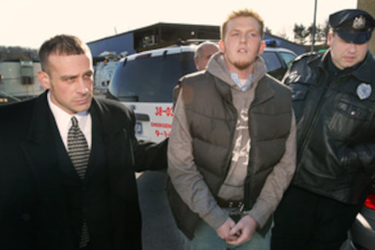 Britt Reid is led in handcuffs and ankle shackles into court in King of Prussia by West Conshohocken police and detectives yesterday to face charges stemming from last week's alleged road-rage incident.