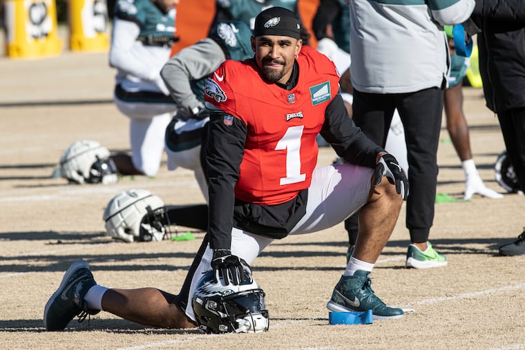 Philadelphia Eagles’ Jalen Hurts strech during practice at the NovaCare Complex in Philadelphia, Pa. Thursday, Jan 11, 2024.