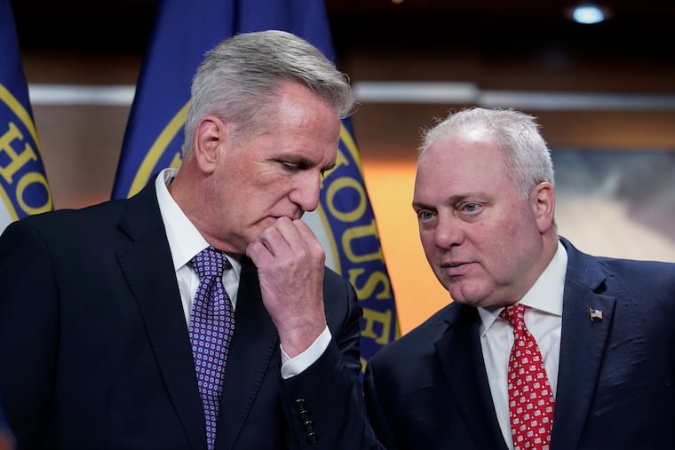 House Minority Leader Kevin McCarthy, R-Calif., left, confers with Minority Whip Steve Scalise, R-La., during a news conference about the appropriations process by the majority Democrats to fund the government, at the Capitol in Washington in December.