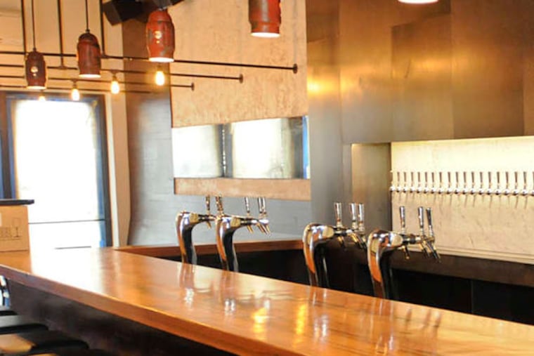 The bar at Tria Taproom, 2005 Walnut St. No bottles - it's all on tap.