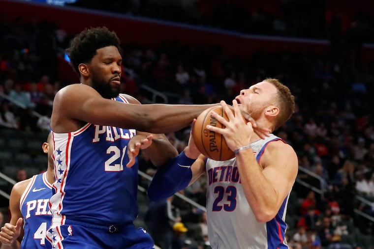 Sixers center Joel Embiid (21) fouling Pistons forward Blake Griffin during the teams' meeting in December.