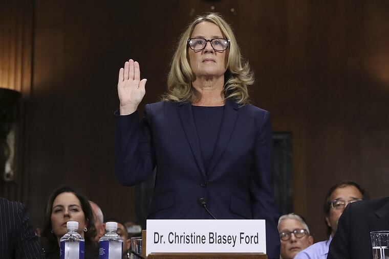 Christine Blasey Ford is sworn in before the Senate Judiciary Committee on Capitol Hill in Washington on Thursday, Sept. 27, 2018.