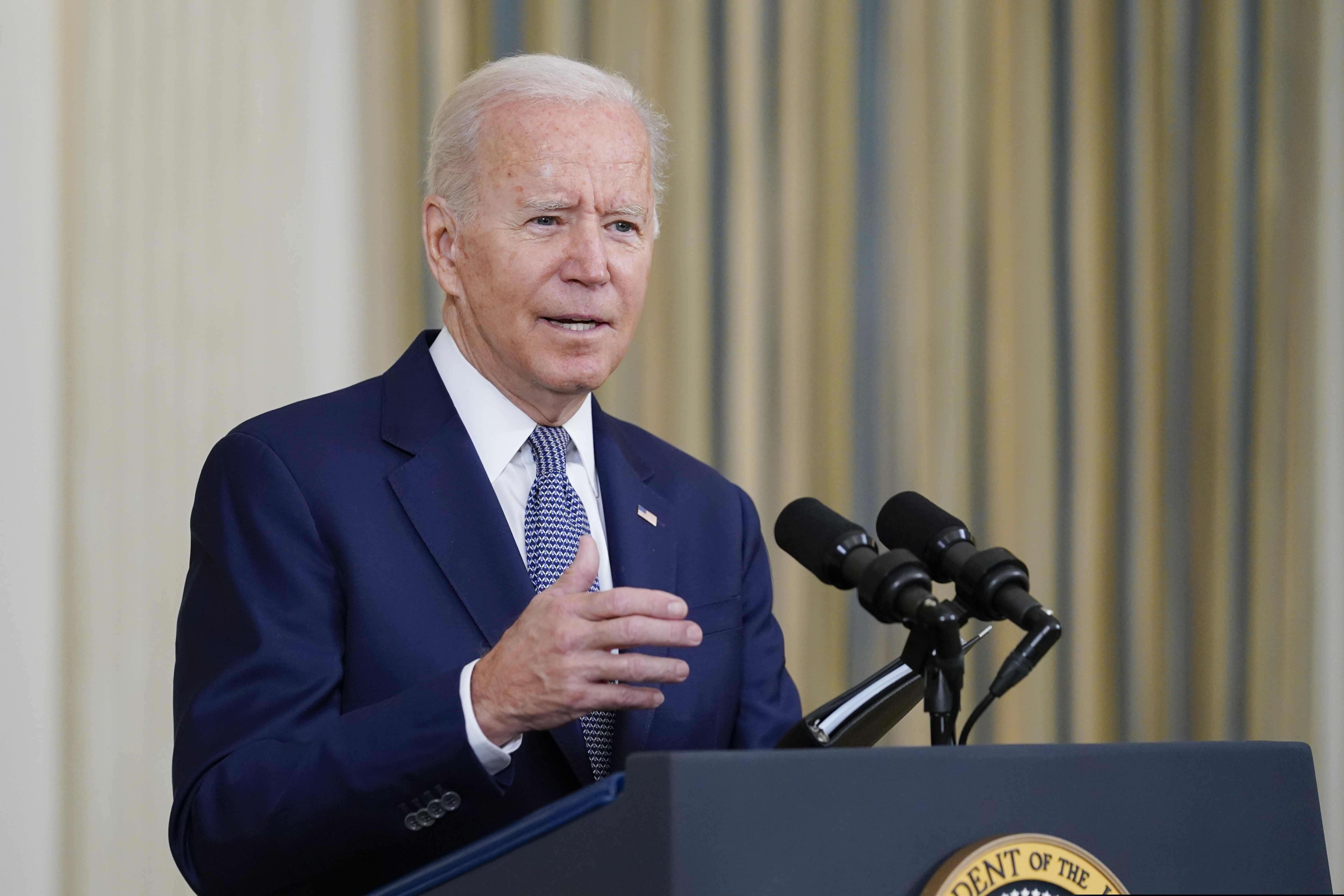 President Joe Biden speaks from the State Dining Room of the White House in Washington, Friday, Sept. 3, 2021, on the August jobs report.