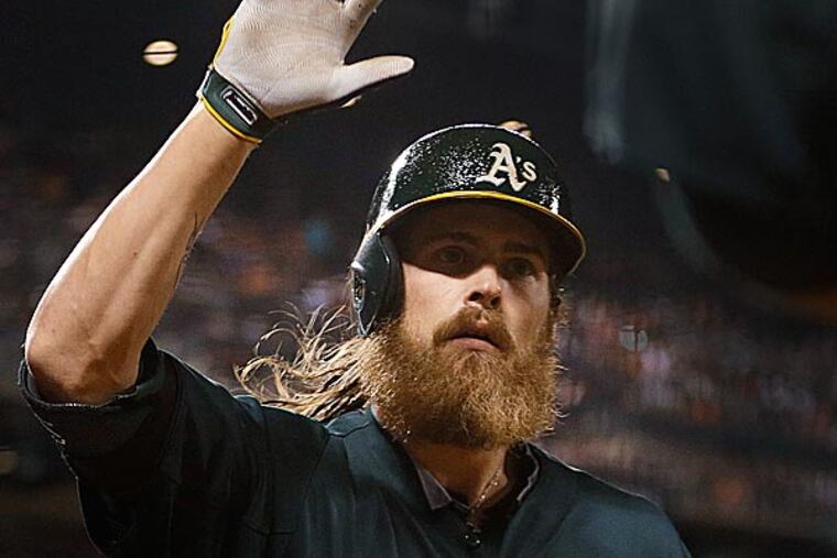 A's outfielder Josh Reddick has gotten himself into a hairy situation. (Ben Margot/AP)