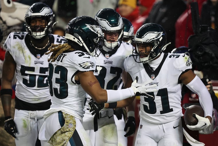 Eagles safety Kevin Byard (right) celebrates his second-quarter interception with his teammates during the victory against the Kansas City Chiefs.