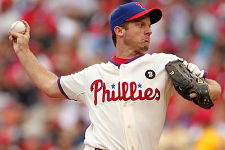 Roy Oswalt left Wednesday's start after only two innings with back tightness. (Ron Cortes/Staff file photo)