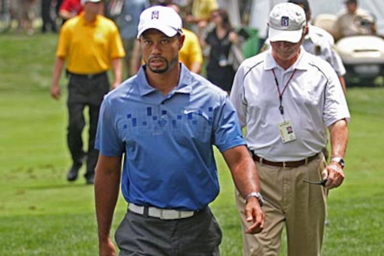 Many believe Tiger Woods may not have a chance at breaking Jack Nicklaus' major wins record. (Michael Bryant/Staff Photographer)