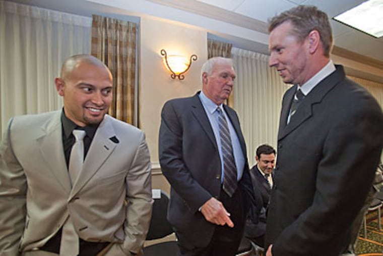 Roy Halladay (right) was honored at the Philadelphia Sports Writers Association dinner last night. (David M Warren/Staff Photographer)