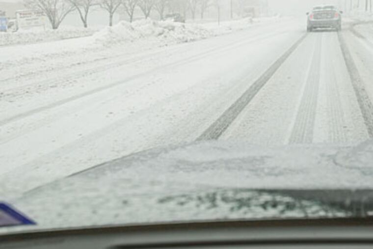 Poor visibility for drivers in the near white-out conditions on Route 45 in Woodbury as the heavy snow begins to fall Wednesday morning. Conditions have rapidly deteriorated since then and will be life-threatening at times this afternoon and tonight. (David M Warren / Staff Photographer)