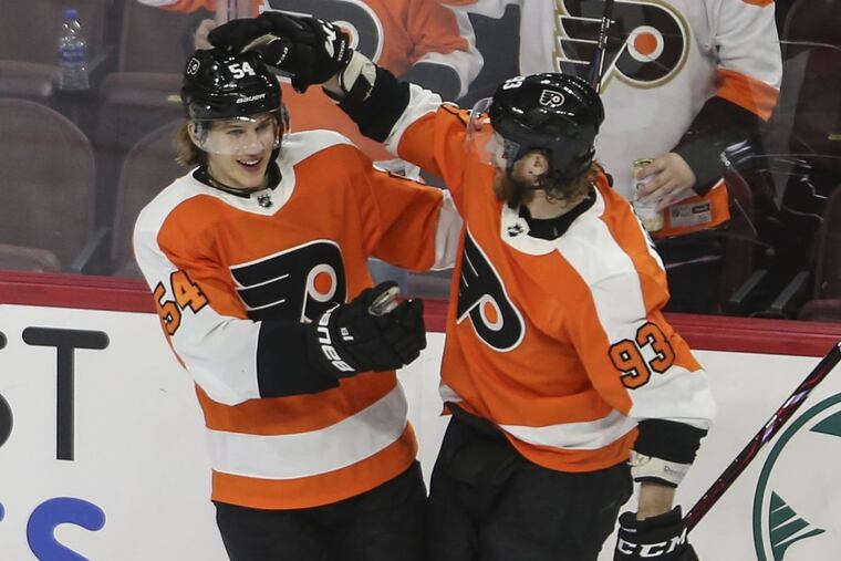Jake Voracek (right) and linemate Oskar Lindblom, celebrating a goal last month against the Rangers.