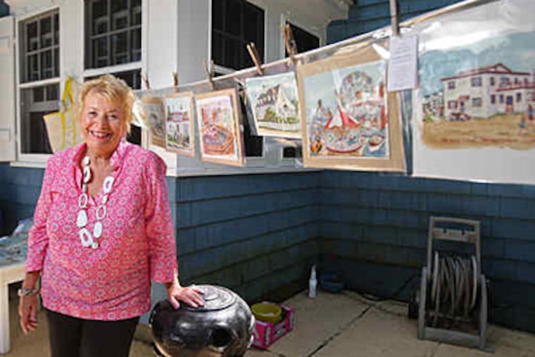 "I like to share memories," says Cathleen Engelsen, who paints Shore scenes and landmarks at home in Surf City. (Michael Bryant / Staff)