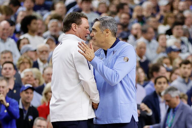 Villanova coach Jay Wright congratulating Kansas' Bill Self after the Jayhawks' 81-65 victory Saturday night at the Superdome.