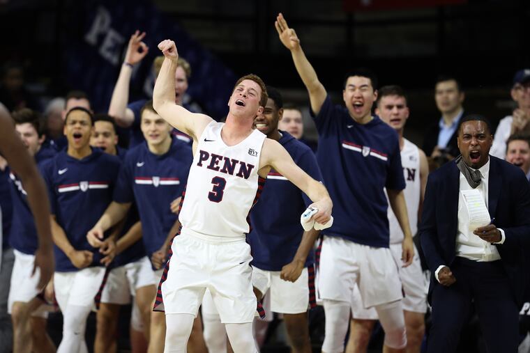 Jake Silpe (center) and the Penn bench celebrate as the Quakers pull away from Yale in the first half.