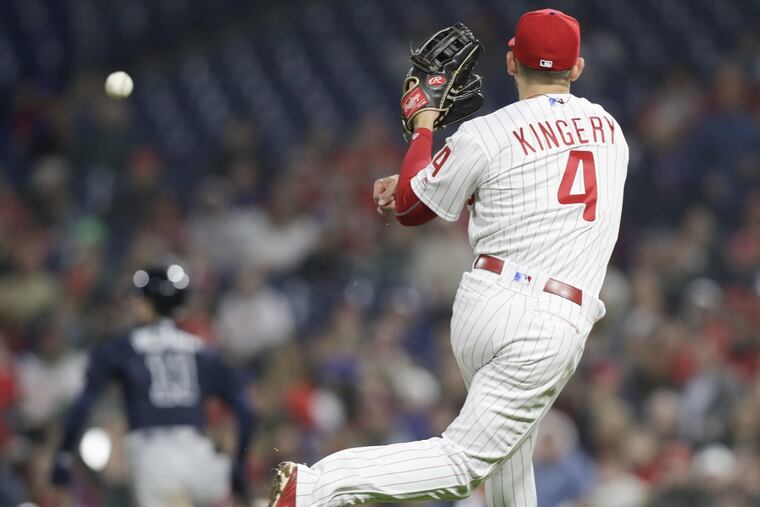 Phillies rookie Scott Kingery throws to first base after Braves outfielder Ender Inciarte Jr.’s bunt attempt earlier this season.