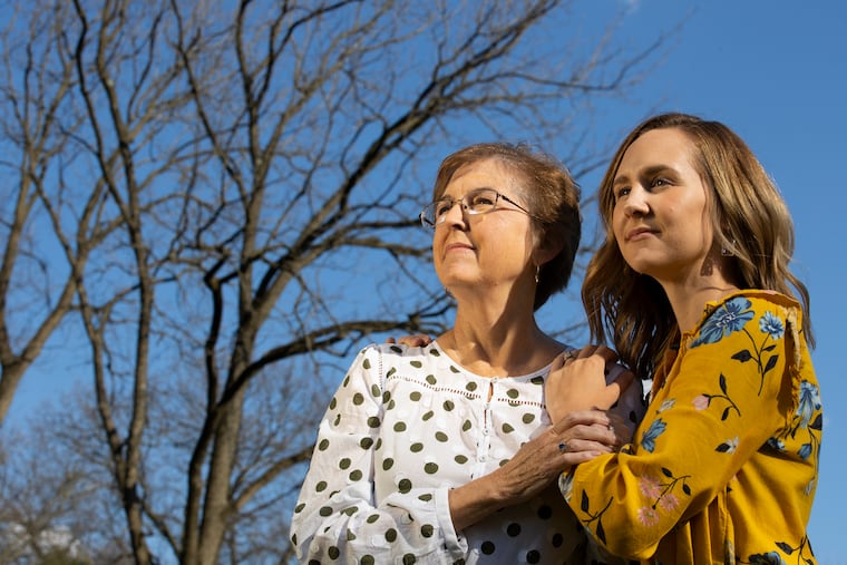 Barbara Small, left, with her daughter Lindsay Ward at a neighborhood park in West Deptford.