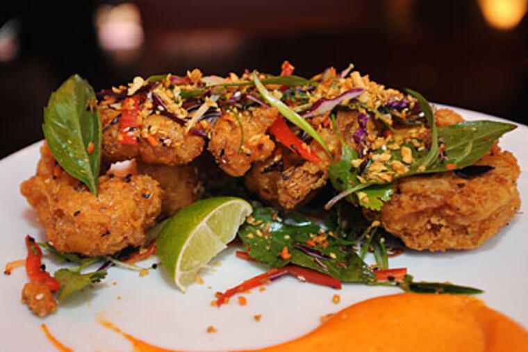An exceptional menu highlight is the crisply fried "salt and pepper" style shrimp with confettilike carrot and scallion salad and spicy garlic aioli. (SHARON GEKOSKI-KIMMEL / Staff Photographer)
