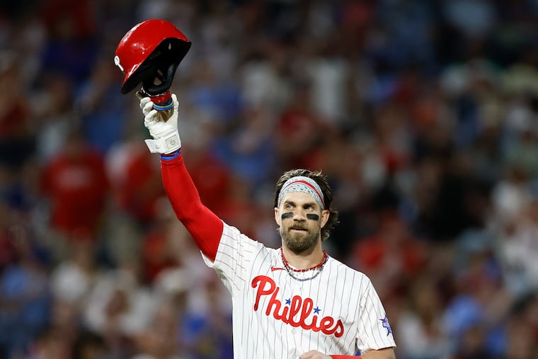 Phillies star Bryce Harper says both sides of the pending labor dispute need to "come together and understand what is best for both sides to make it work.”