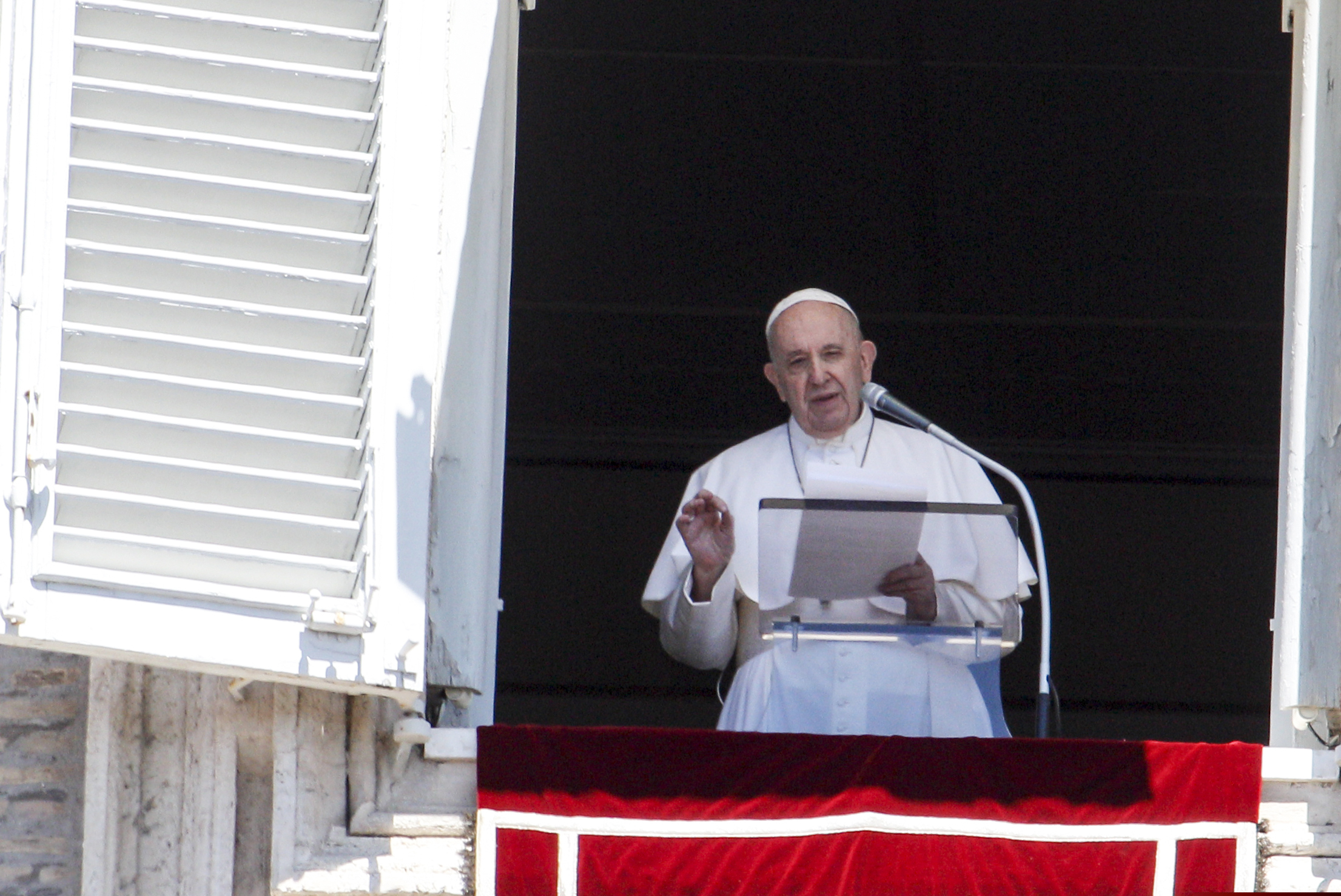 Pope Francis speaking during the Angelus prayer from his studio window overlooking St. Peter's Square at the Vatican on July 5.