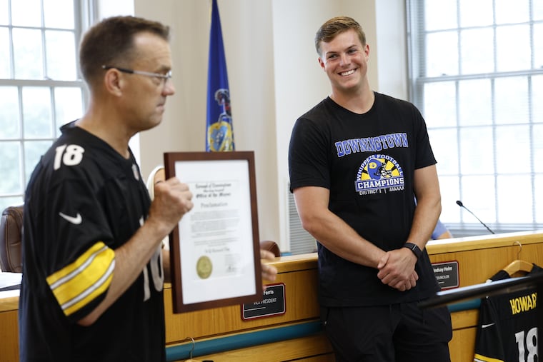 Downingtown mayor Phil Dague (left) honors Pittsburgh Steelers quarterback Will Howard, by proclaiming July 9 to be Will Howard Day.
