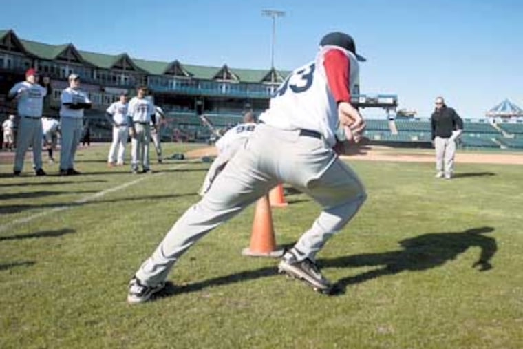 Matthew Cordaro pushes off to run a 60 yard sprint during tryuouts for the Camden Riversharks. ( RON TARVER / Staff Photographer )