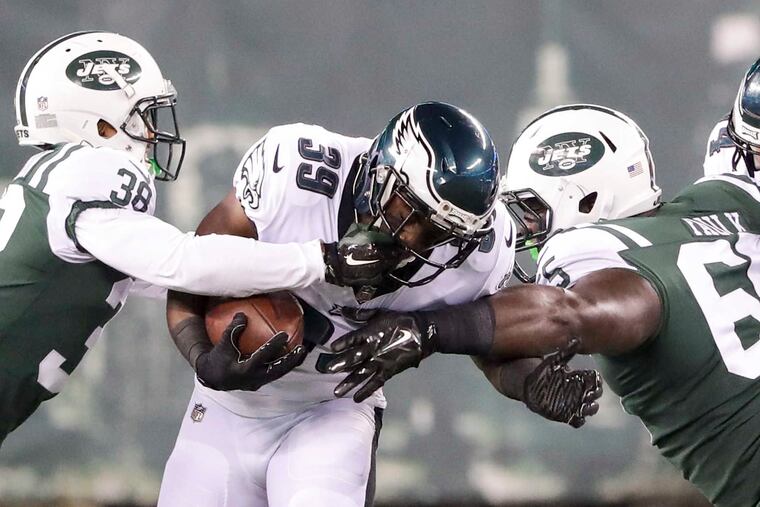 Eagles running back Byron Marshall (center) had a memorable preseason moment for the Birds two years ago.