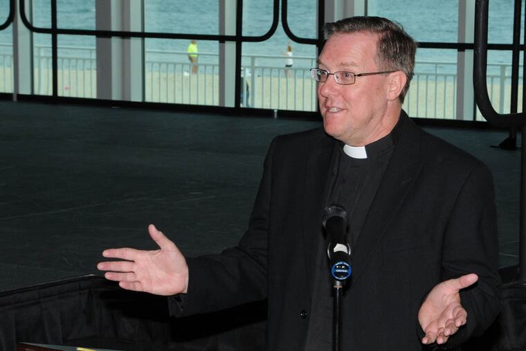 The Rev. Jeffrey Elliott, of Cape May Lutheran Church, delivers a sermon during Sunday vespers, a nondenominational service at Cape May’s new Convention Hall.
