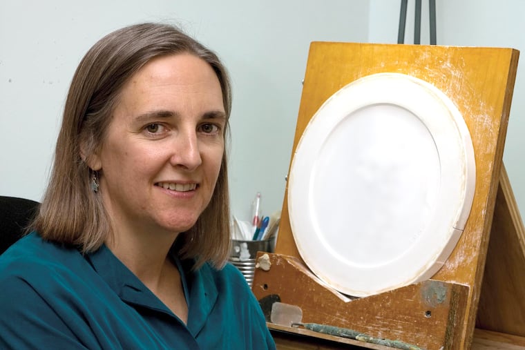 Medallic artist Phebe Hemphill at the U.S. Mint in Philadelphia, where she designed the commemorative quarter honoring Celia Cruz, also known as the Queen of Salsa.