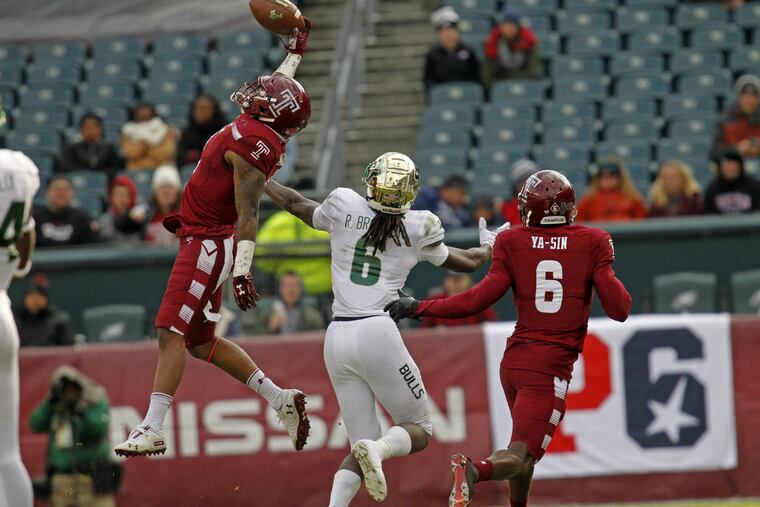 Temple's Delvon Randall left makes an interception on a pass for South Florida's Juwuan Brown (6) and during a college football game, Saturday Nov. 17, 2018 in Philadelphia, Pa. Temples #6 Rock Ya-Sin. Temple won 27-17.( H. Rumph Jr / For the Inquirer )
