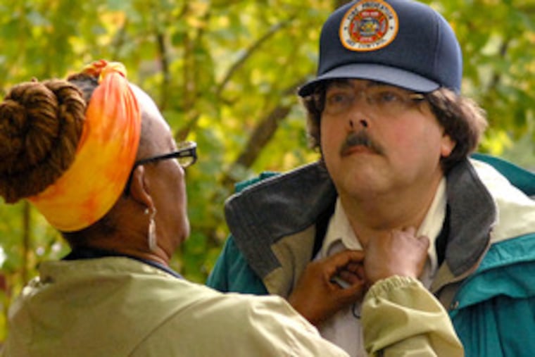 For a documentary about Greenbelt Knoll, built in Northeast Philadelphia in the 1950s, developer's son Gene Milgram is miked by filmmaker Tina Martin.