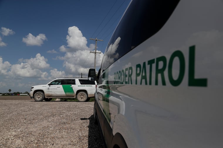 Border patrol vehicles parked on a levy near the Rio Grande, where they constantly patrol for people illegally crossing into the U.S. from Mexico, on June 25, 2018.