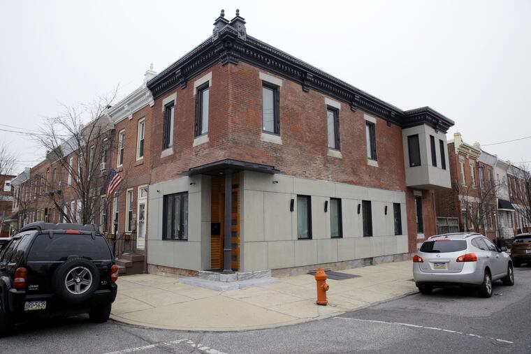 Micah Hanson, the principal of Hexagon Studio Architect, has restored the entry and cornice of Roma Sawchyn's house in Philadelphia.
