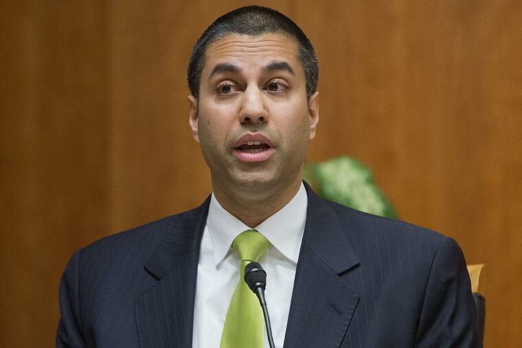 Federal Communication Commission Commissioner Ajit Pai speaks during an open hearing in Washington in 2015.