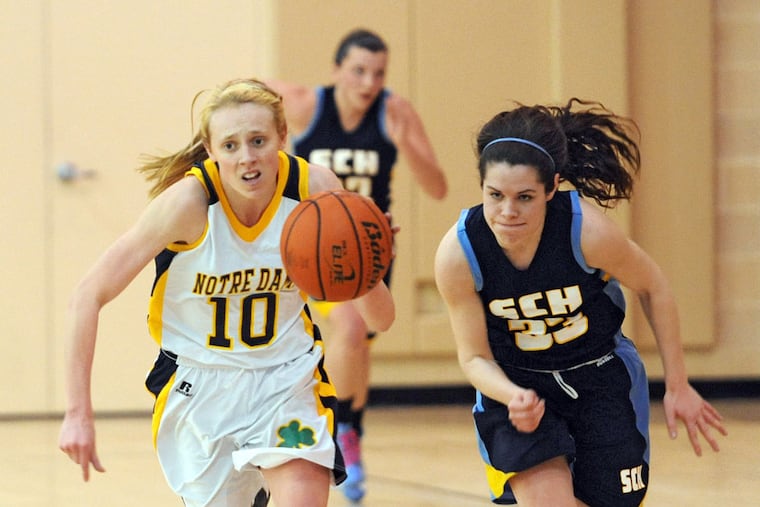 Academy of Notre Dame's Kathleen Fitzpatrick races up court after stealing the ball from Springside Chestnut Hill's Maddi Hinchey, who gives chase during the first half action Feb. 1, 2013, at Notre Dame. Notre Dame won 47-41 win.
