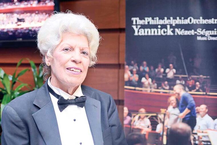 Antoinette DuBiele, one of the Kimmel Center's longest-serving ushers, has a blindingly silver iron helmet of hair and opinions that are just as unyielding. She poses in the Kimmel Center lobby September 28, 2014. ( TOM GRALISH / Staff Photographer )