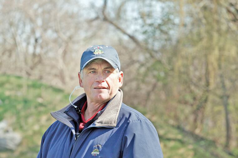 Merion Golf Club director of golf course operations, Matt Shaffer looks over the East Course during a preview day on Monday, April 22, 2013. ( Yong Kim / Staff Photographer )