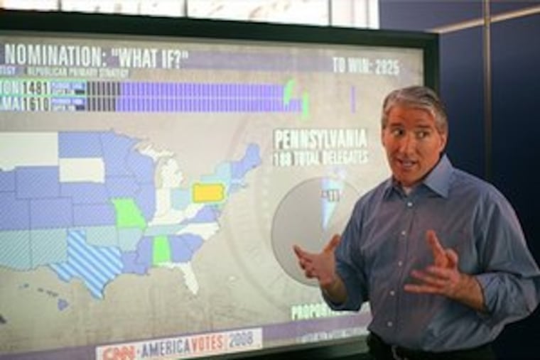 CNN's John King gets animated with his election map. Networks are using more computer visuals among their low-tech ones.