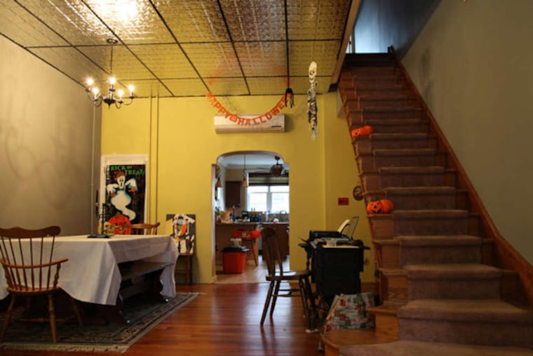 Alexander and Stephanie Zola replaced carpets with hardwood floors in their East Passyunk Square home.