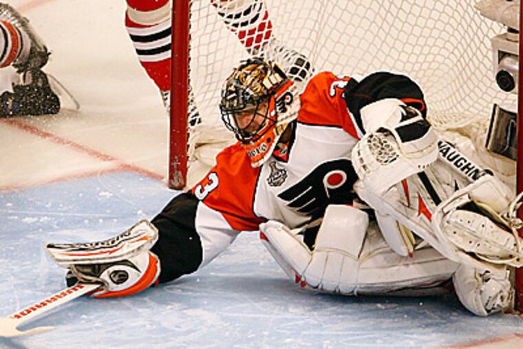 Brian Boucher makes a save in the 3rd period. (David Maialetti / Staff Photographer)