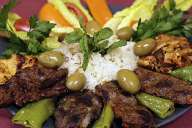 Hamifgash's mixed grill dish. (YONG KIM / Staff photographer)