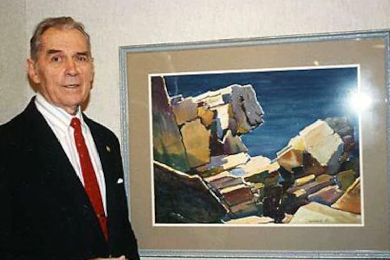 Edward V. Lis with one of his landscapes. He began painting portraits when he was in a work camp in World War II.
