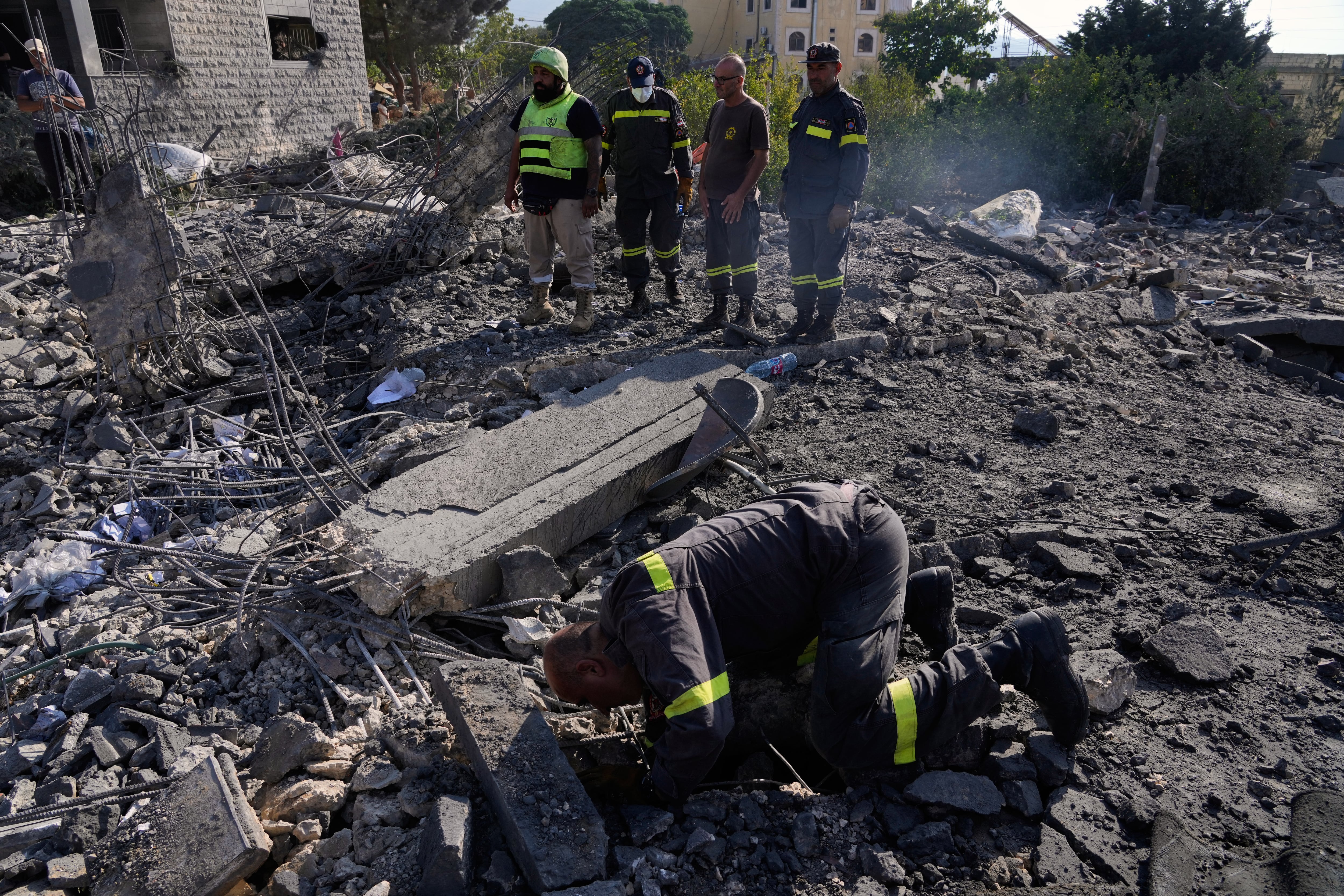 Israeli airstrikes on a village in southern Lebanon kill 9 people, wound 13