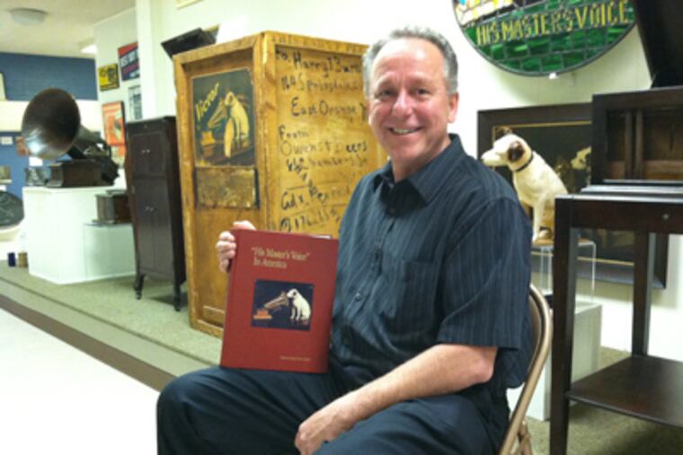 Fred Barnum, author of a history of RCA in Camden, at the Camden County Historical Society exhibit about the company. (Kevin Riordan / Staff)