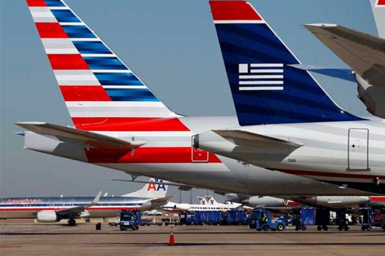 US Airways and American want to tie the knot. (Tom Fox / Dallas Morning News)