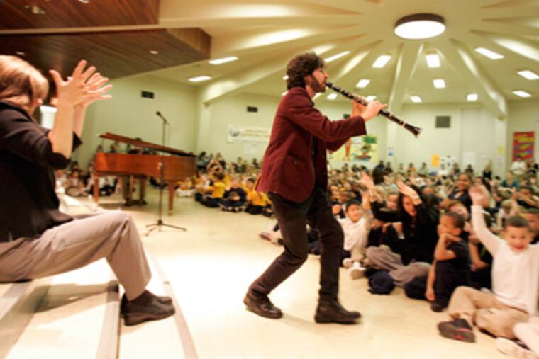 Oran Etkin and his jazz combo perform at John Hancock Demonstration School in Northeast Philadelphia as part of the Listen to Your Buds effort. (David Swanson / Staff Photographer)