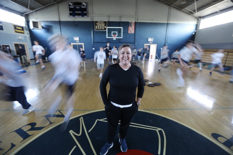 Mary Fran Frankenheimer works on strength and conditioning with the Malvern Prep lacrosse and football teams.