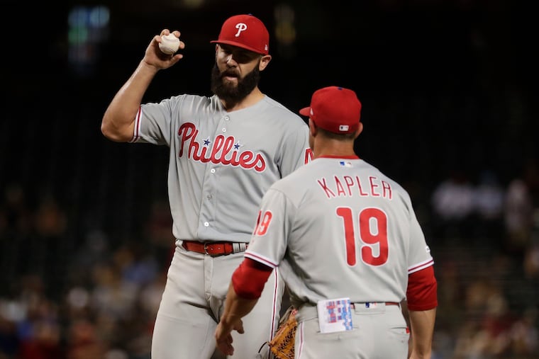 Jake Arrieta waves off manager Gabe Kapler to finish the fifth inning of the Phillies' 8-4 loss to the Diamondbacks on Tuesday.
Philadelphia Phillies manager Gabe Kapler (19) talks with starting pitcher Jake Arrieta during the fifth inning of a baseball game against the Arizona Diamondbacks, Tuesday, Aug. 6, 2019, in Phoenix. (AP Photo/Matt York)