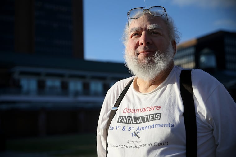 Jeffrey Cutler stands in in front of the James A. Byrne U.S. Courthouse in Philadelphia, where the former East Lampeter tax collector has been a frequent visitor filing litigation.