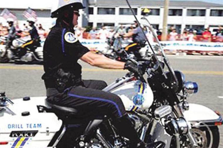 Lawyer Jimmy Binns sported an authentic-looking Philly police uniform, complete with an unpermitted .40-caliber Glock, at the 2010 Hero Thrill Show in Margate, N.J.
