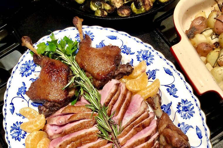 Classic French duck a l'orange, inspired by a recipe from Pierre Calmels at Bibou, made a grand centerpiece for a New Year's Eve feast at Craig LaBan's home.